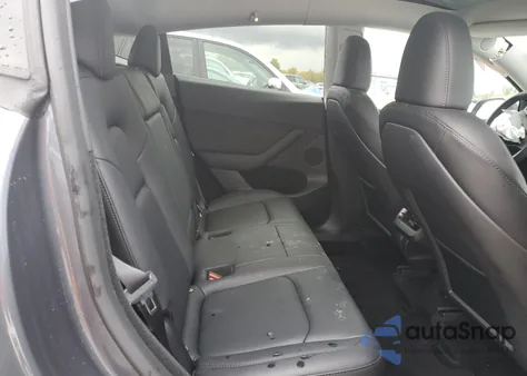 2023 Tesla Model Y from USA, damaged, VIN 7SAYGDED0PF945725